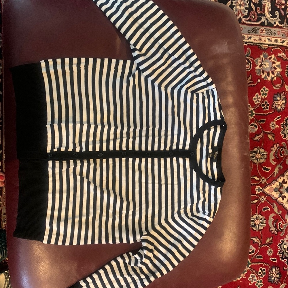 Black and white striped sweater.